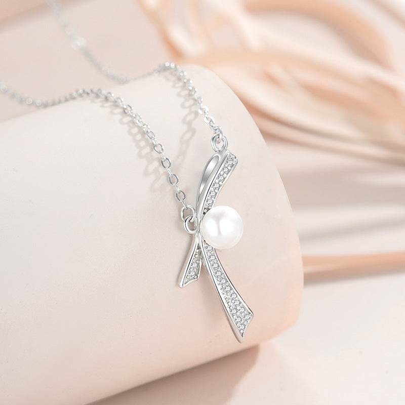 Bell Pearl Ribbon Pendant with Diamonds
